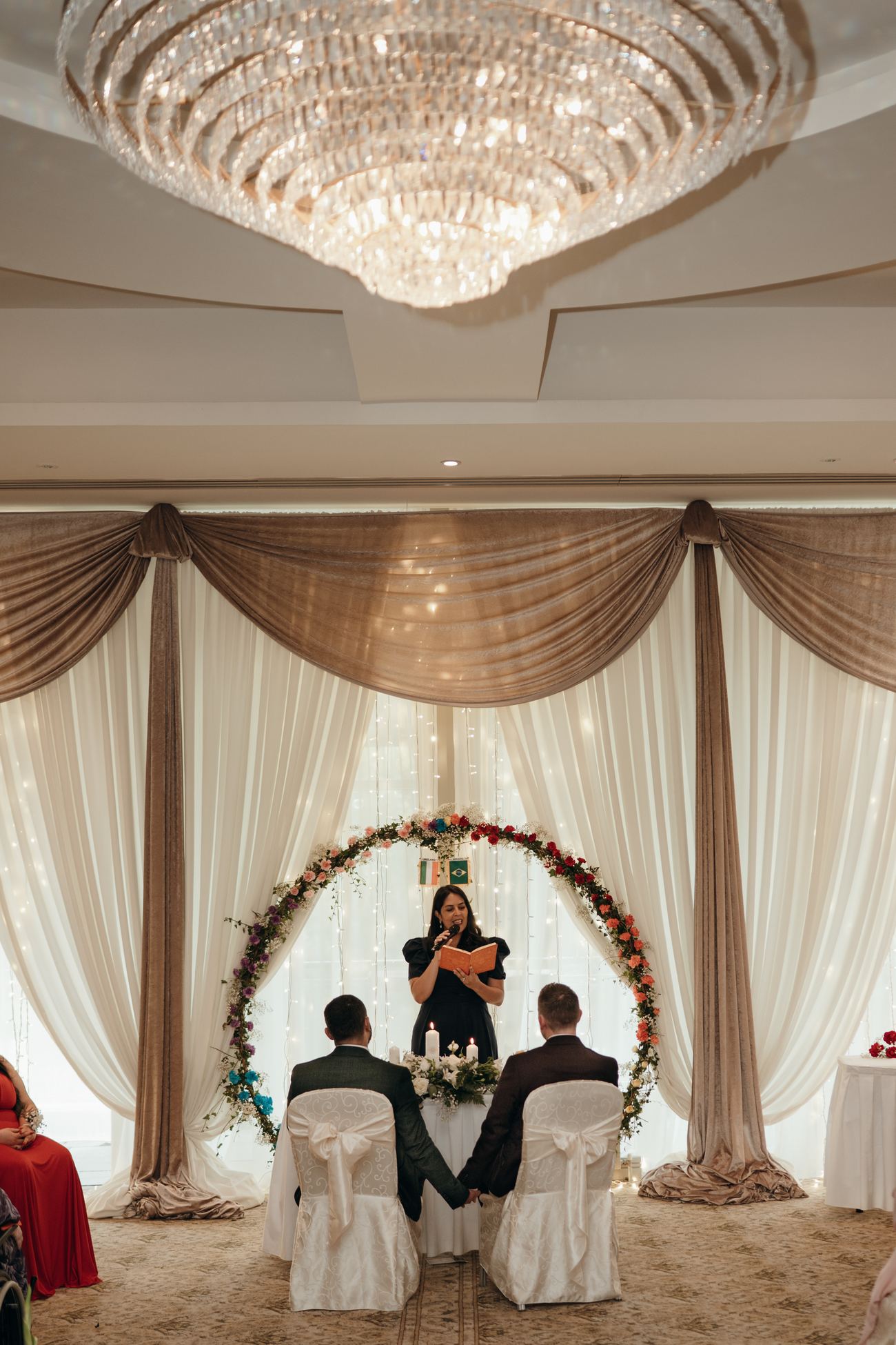 Wide shot of indoor wedding ceremony