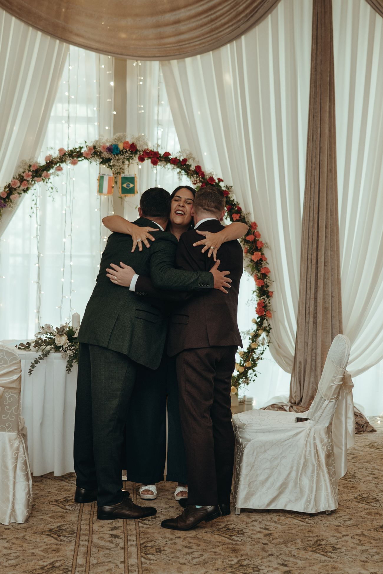 Joyful embrace after wedding ceremony